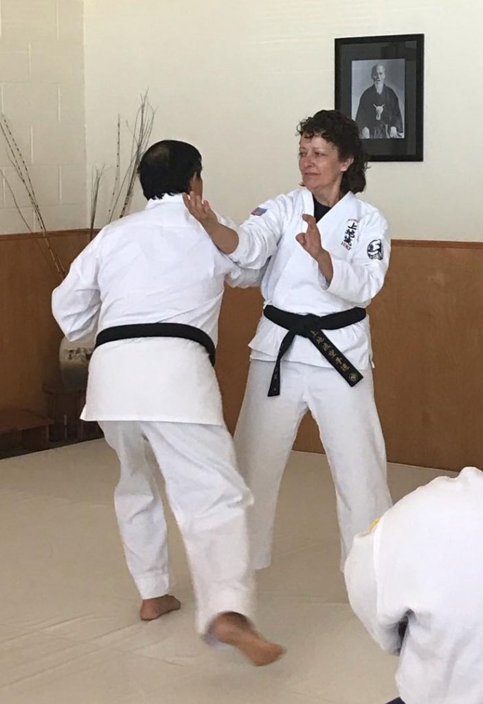 Darin Yee demonstrating an attack with a student.